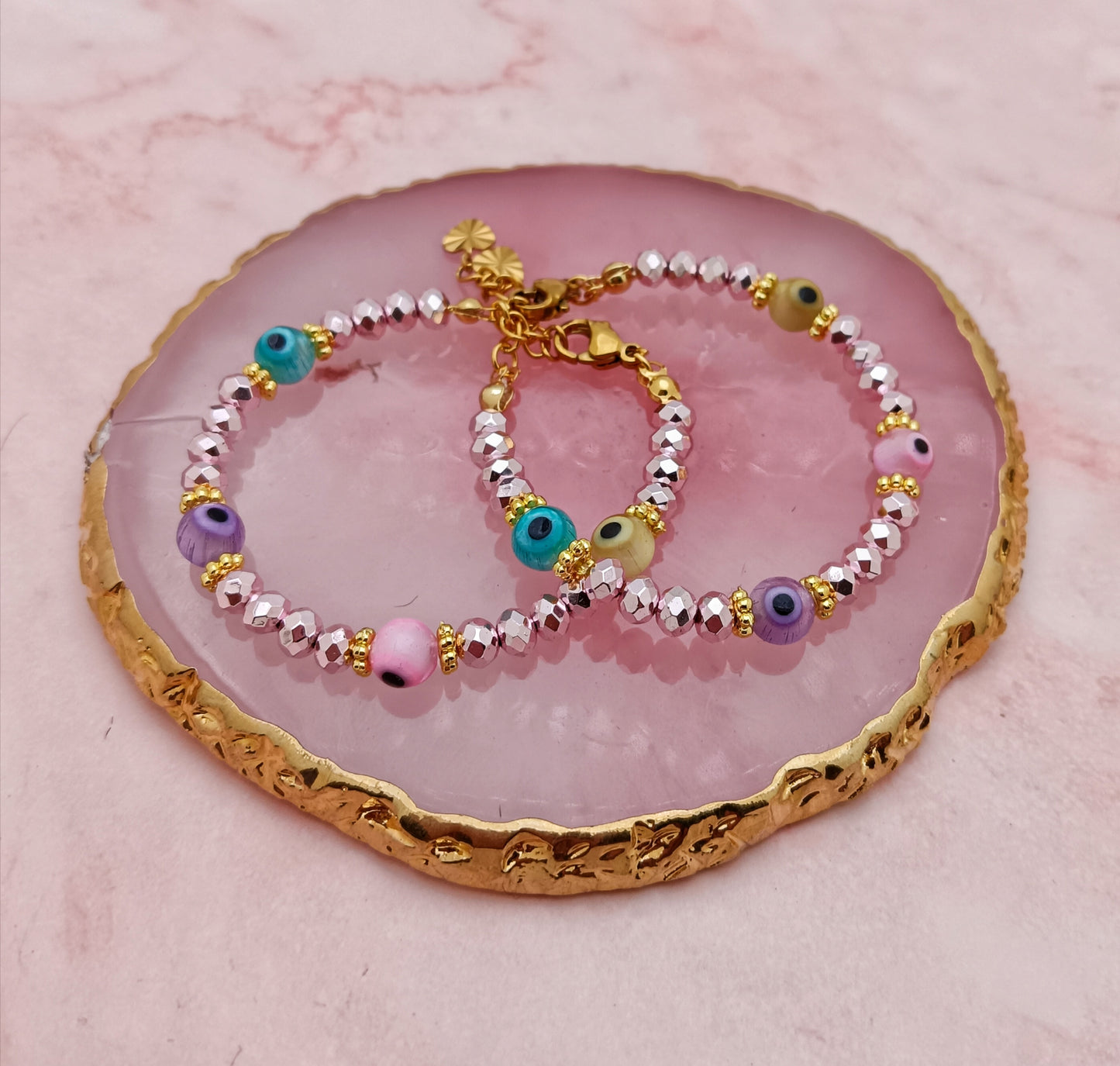 A Pair of Baby Bracelets with Evil Eye Beads