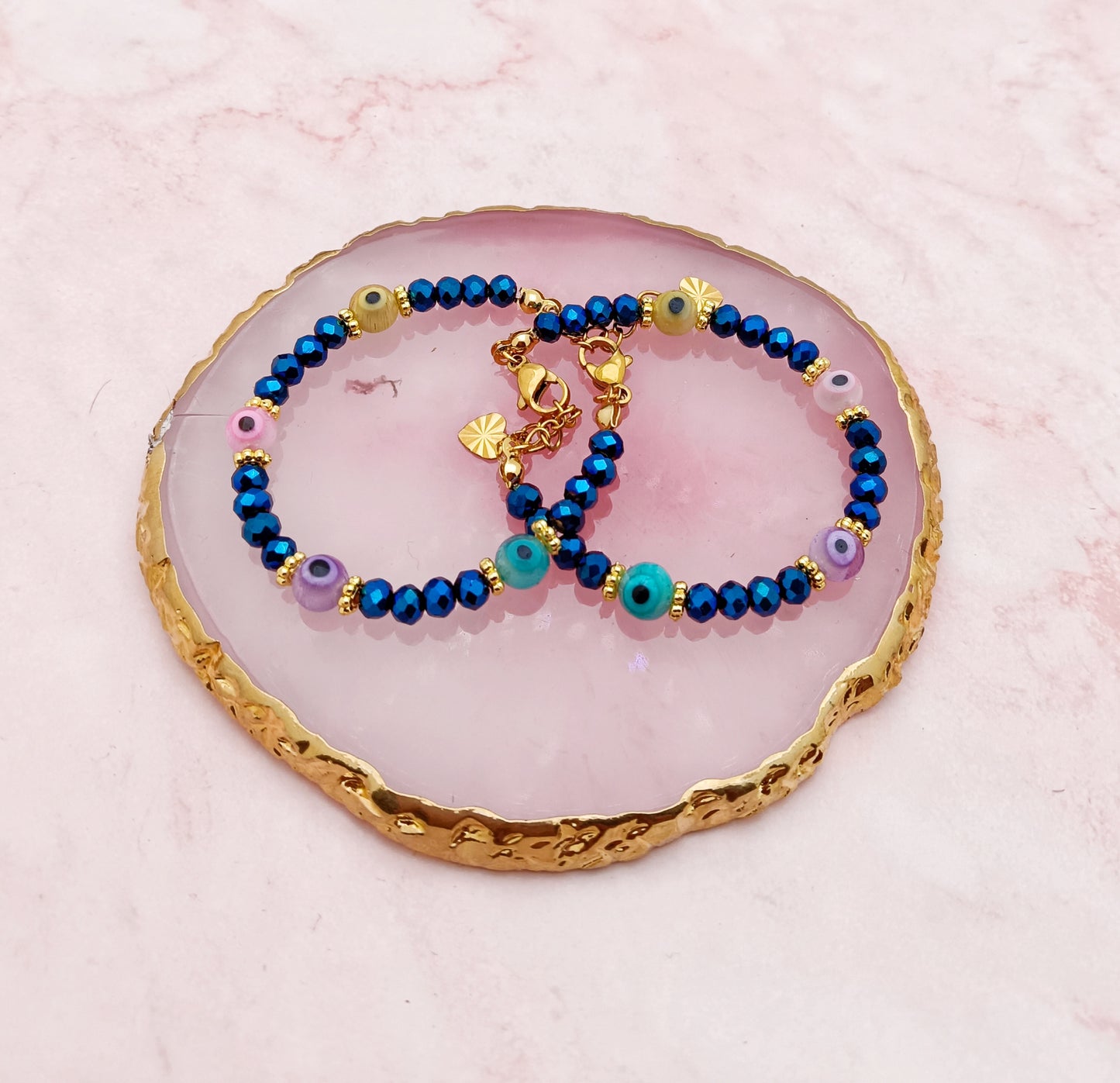 A Pair of Baby Bracelets with Evil Eye Beads