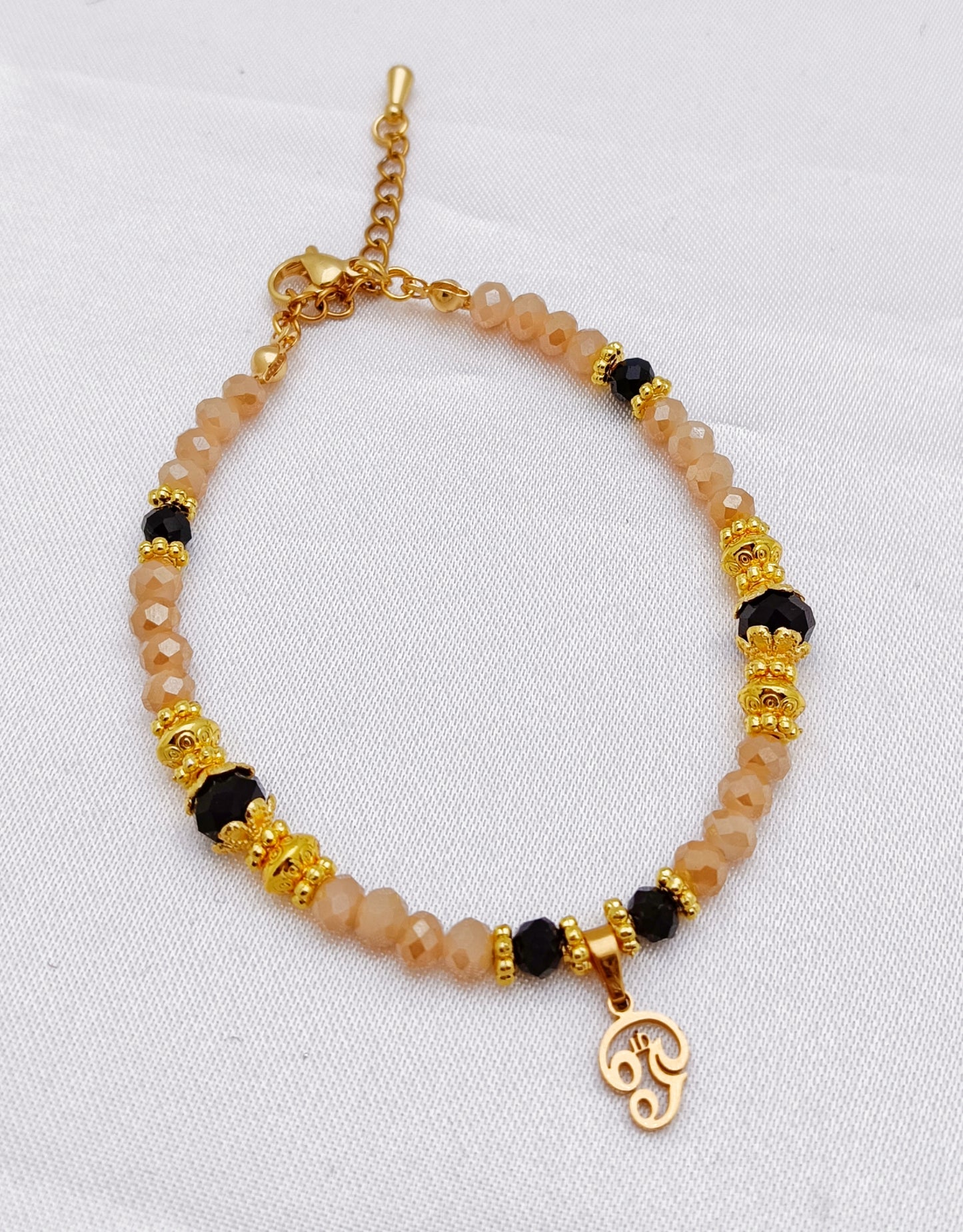 Gold Plated Beaded Bracelet - Aum charm, Black, Cream