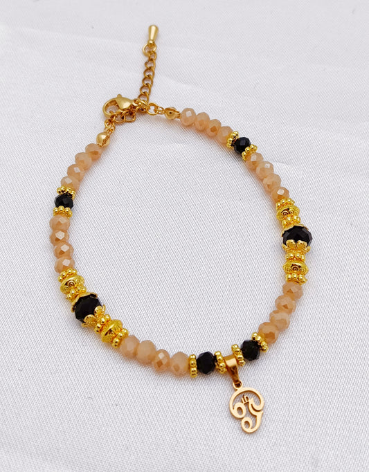 Gold Plated Beaded Bracelet - Aum charm, Black, Cream