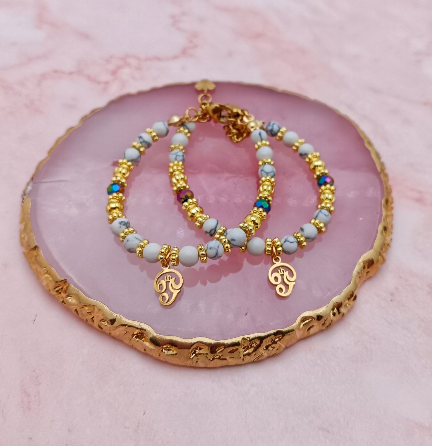 A Pair of Baby Bracelets with Tamil Aum Charms